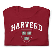 Funny parody “Harverd” logo T-shirt in cardinal red with “VE RY SMART” crest in bold college lettering.