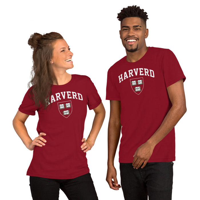 Couple wearing funny parody “Harverd” logo T-shirt in cardinal red with “VE RY SMART” crest in bold college lettering.