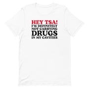 White “Hey TSA! I’m Definitely Not Carrying Drugs in My Cavities” prank T-shirt with bold red and black text.