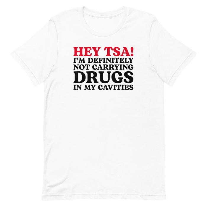 White “Hey TSA! I’m Definitely Not Carrying Drugs in My Cavities” prank T-shirt with bold red and black text.