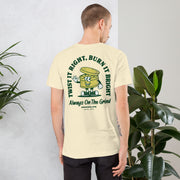 Male model wearing a beige Always on the Grind T-shirt, showing the back design with a weed grinder cartoon.