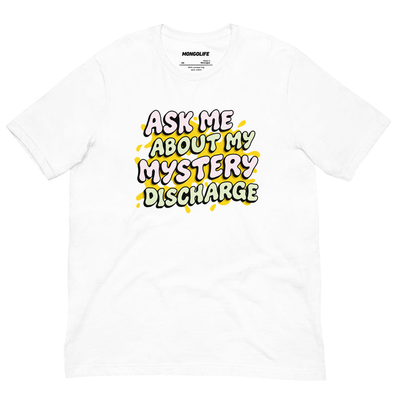 White t-shirt with high contrast colorful drip typography reading “Ask Me About My Mystery Discharge.”