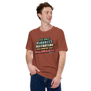 Model wearing heather clay t-shirt with “The Only Minority Destroying This Country Are Billionaires” text in colorful vintage font.