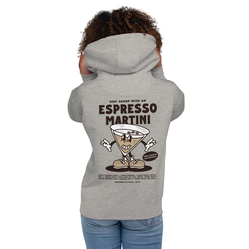 Female model wearing the Espresso Martini hoodie in carbon grey, showing the back design with a smiling martini glass cartoon.