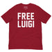 Cardinal Red FREE LUIGI T-shirt showcasing bold white grunge-style text, making a powerful statement.