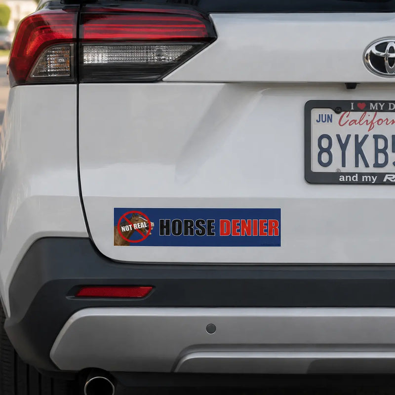 Back of a car with a 'Horse Denier' bumper sticker and a California license plate.