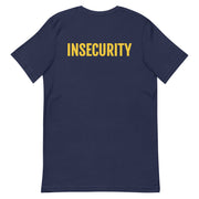 Back view of a navy t-shirt with "INSECURITY" in bold yellow text styled like traditional SECURITY uniforms.