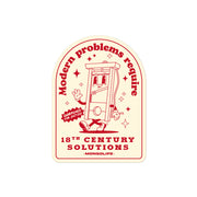 "Modern Problems Require 18th Century Solutions" sticker featuring a retro cartoon guillotine with bold typography.