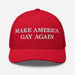 Red trucker hat with white “Make America Gay Again” embroidery, front view showing structured crown.