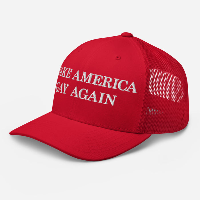 Red mesh back hat with visible snapback closure and “Make America Gay Again” embroidery from side angle.