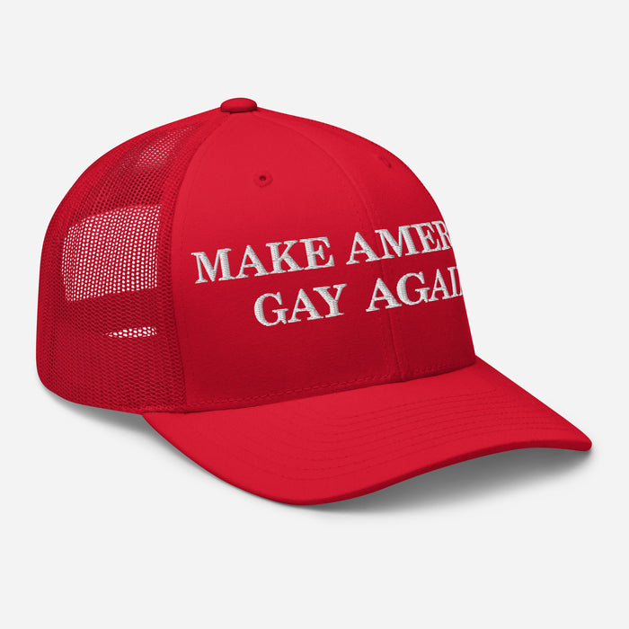 Side angle of red “Make America Gay Again” mesh trucker hat, showing bill curve and embroidery depth.