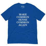 Blue t-shirt with “Make Common Sense Common Again” printed in bold white serif font, laid flat for product display.