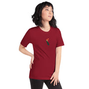 A female model wearing the cardinal red "No Kings, No Tyrants" t-shirt, showing the small front chest print of a flaming molotov cocktail.