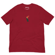 Cardinal red t-shirt featuring a small chest print of a flaming molotov cocktail, symbolizing resistance and revolution.