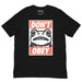Black t‑shirt showing “Portland Frogs Don’t Obey” graphic with protest‑style frog illustration and bold white text.