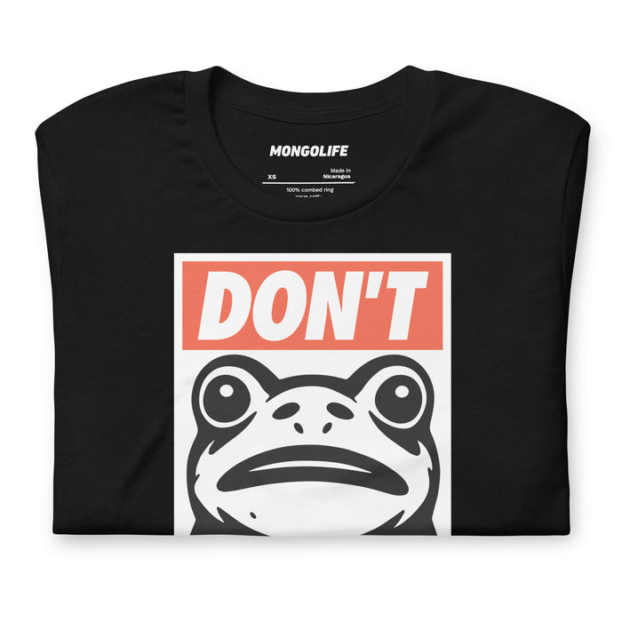 Folded black tee featuring the “Portland Frogs Don’t Obey” design visible on front chest area.