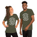 Two models wearing Military Green “Radicalized by Basic Decency” t-shirts, smiling and facing forward to show the design.