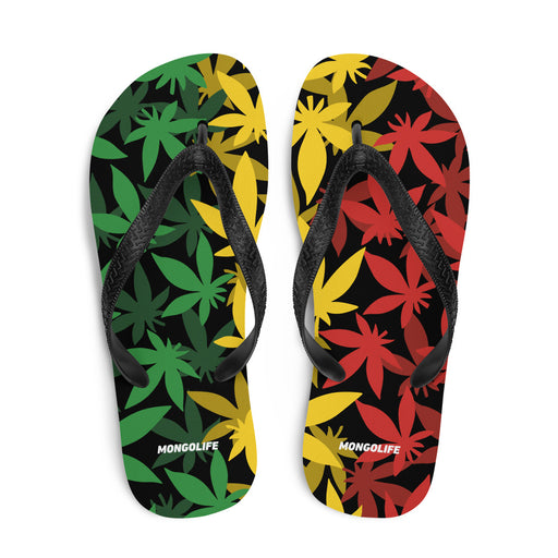 Rasta-colored cannabis leaf pattern on flip-flops against a black background.