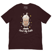 Oxblood black t-shirt featuring a cartoon bubble tea cup with a playful smile and the phrase "Suck My Balls" in a fun, eye-catching font.