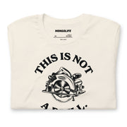 Neatly folded vintage white t-shirt displaying the "This Is Not A Drill" design, perfect for DIY lovers and dad joke enthusiasts.