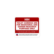 3-inch red and white parody sticker reads 'Toilet Cameras Are for Behavioral and Gender Research Purposes Only' with satirical GOP branding, displayed on white background."