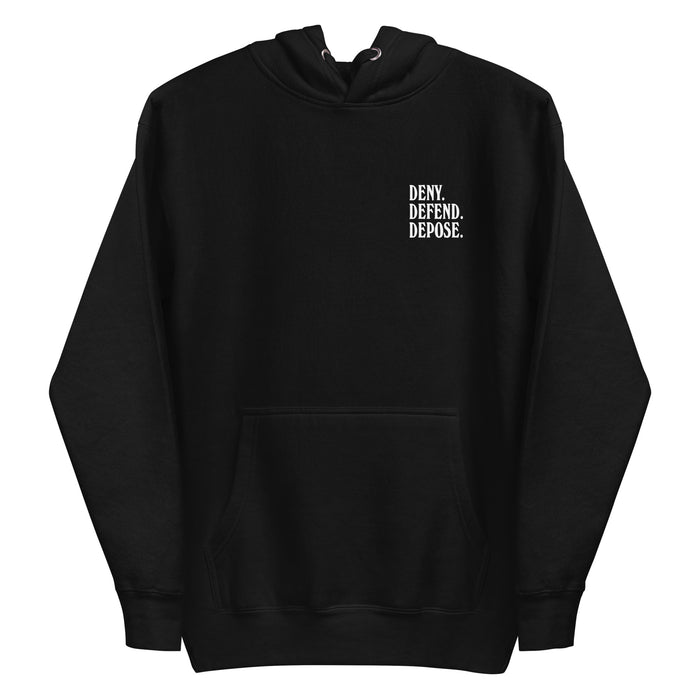 Front view of the 'Deny Defend Depose' hoodie in black, featuring minimalist left chest text in bold white print.