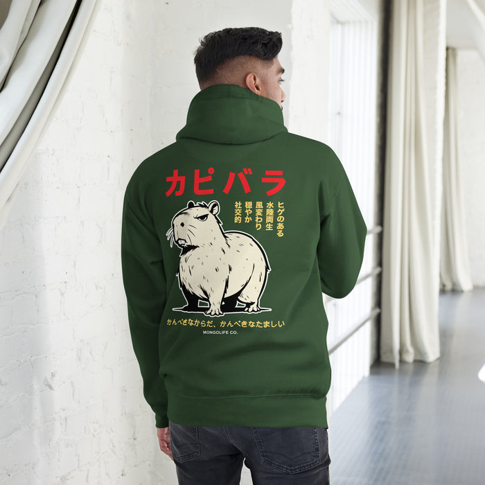 Man wearing a green  cozy hoodie with friendly capybaras and playful Japanese script, in a charming cartoon style.