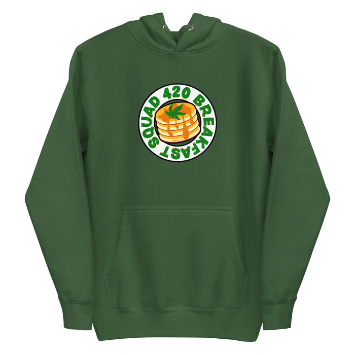 Forest green hoodie featuring "420 Breakfast Squad" text around a design of pancakes topped with a cannabis leaf.