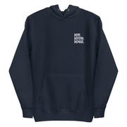 Front view of the 'Deny Defend Depose' hoodie in navy, showcasing clean left chest text design for subtle style.