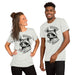 Couple wearing ash colored t-shirts with the text "Eat Trash, Do Crime" and a smirking raccoon.