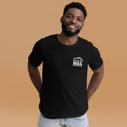 A person wearing the black "Defund the HOA" T-shirt, showing the minimalist chest design while standing in a casual setting.