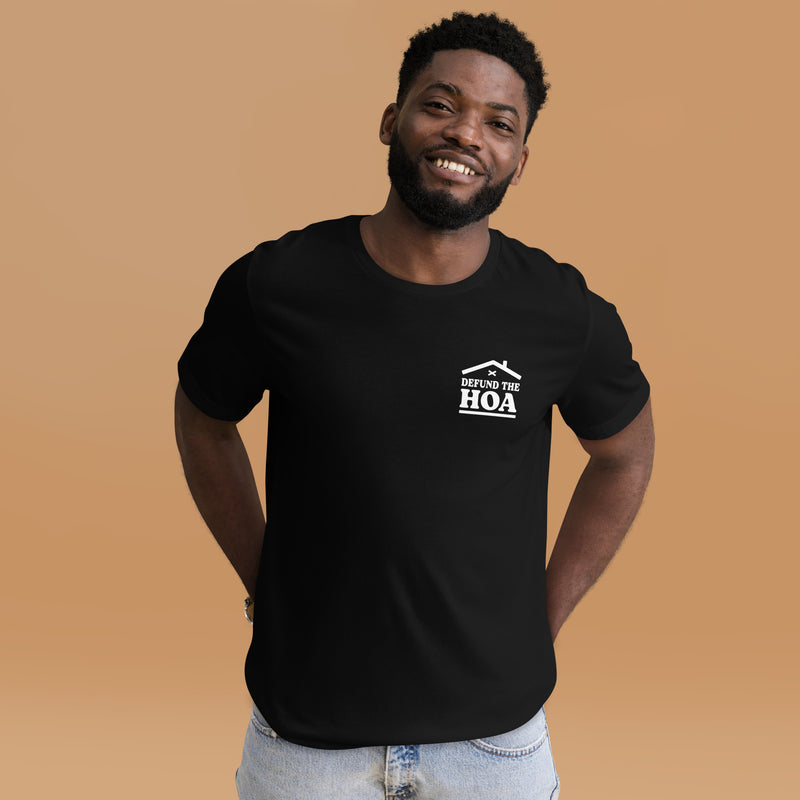 A person wearing the black "Defund the HOA" T-shirt, showing the minimalist chest design while standing in a casual setting.