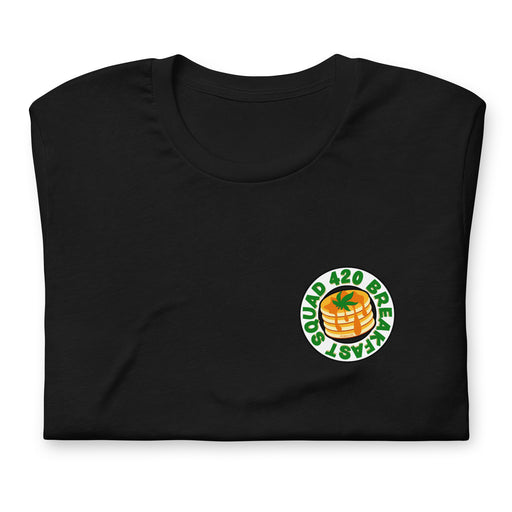 Folded black T-shirt with "420 Breakfast Squad" around a pancake stack and cannabis leaf design.