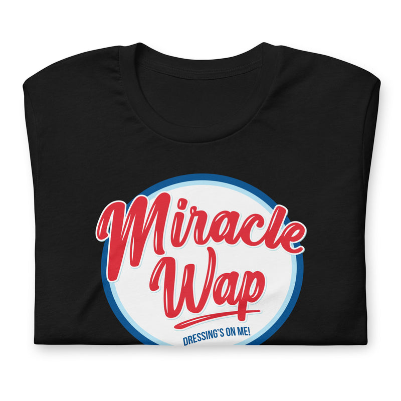 Black folded Miracle Wap t-shirt with parody logo and "Dressing's on me!" text.