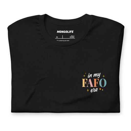 Folded black T-shirt with a small left chest print reading "In My FAFO Era" in colorful retro-style text surrounded by sparkling stars.