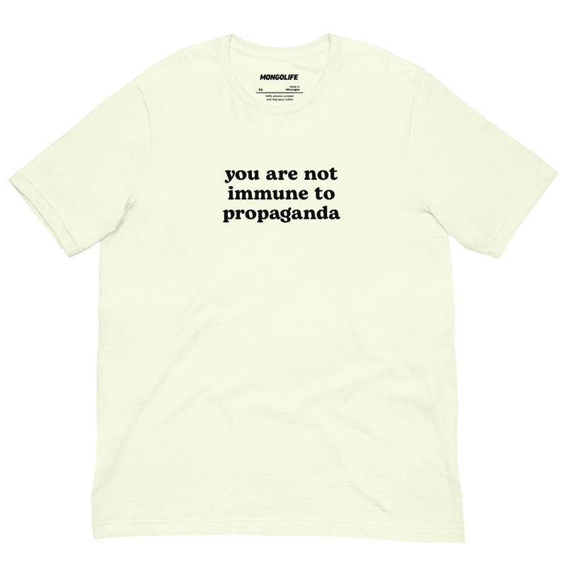 Bright citron yellow t-shirt featuring the "You Are Not Immune to Propaganda" text in contrasting black.