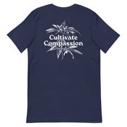 navy t-shirt with "Cultivate Compassion" design, weed (back)