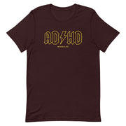 Oxblood Black ADHD T-Shirt with text in a yellow, rock-inspired font