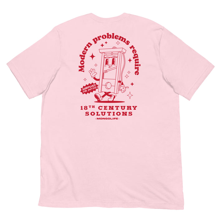 Soft pink T-shirt showcasing a full-back design with a guillotine cartoon and satirical text about the current political climate.