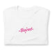 Folded white casual tee with 'Blazed' logo in pink, decorated with stars and cannabis leaves.
