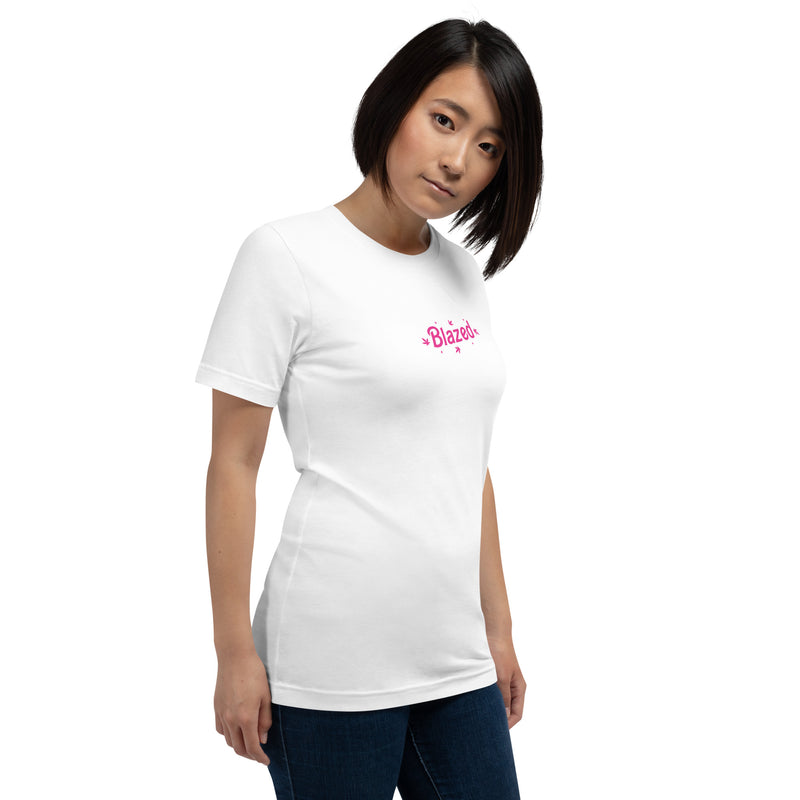 Woman wearing a white  casual tee with 'Blazed' logo in pink, decorated with stars and cannabis leaves.