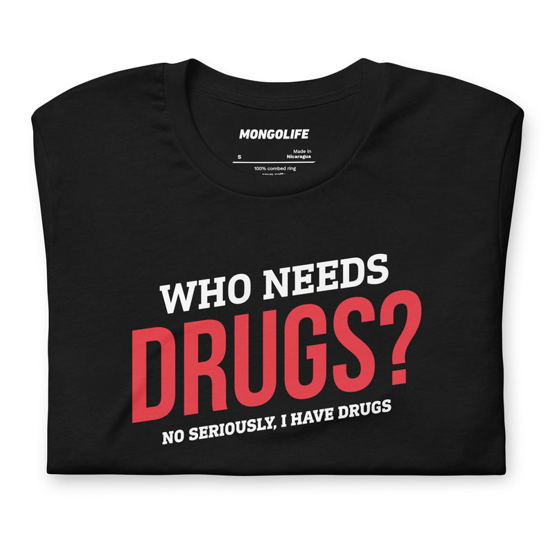 Folded black Who Needs Drugs? T-shirt showcasing crisp red and white lettering on soft cotton fabric.