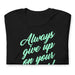 Folded Funny "Always Give Up On Your Dreams!" t-shirt with the title text in a pretty green cursive script, perfect for a laugh and casual wear.