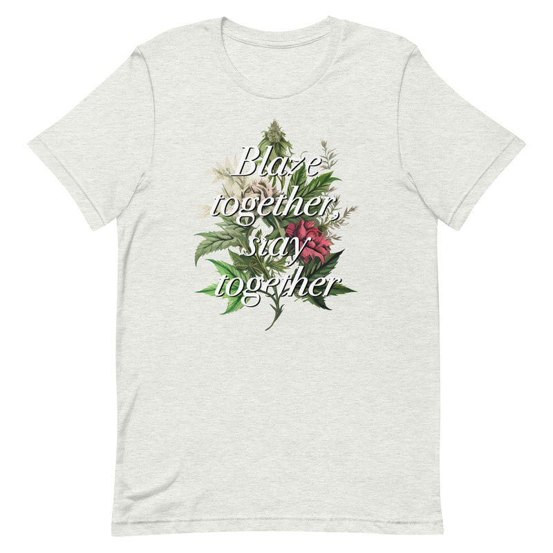 Ash color t-shirt with "Blaze together, stay together" design featuring floral and cannabis elements.