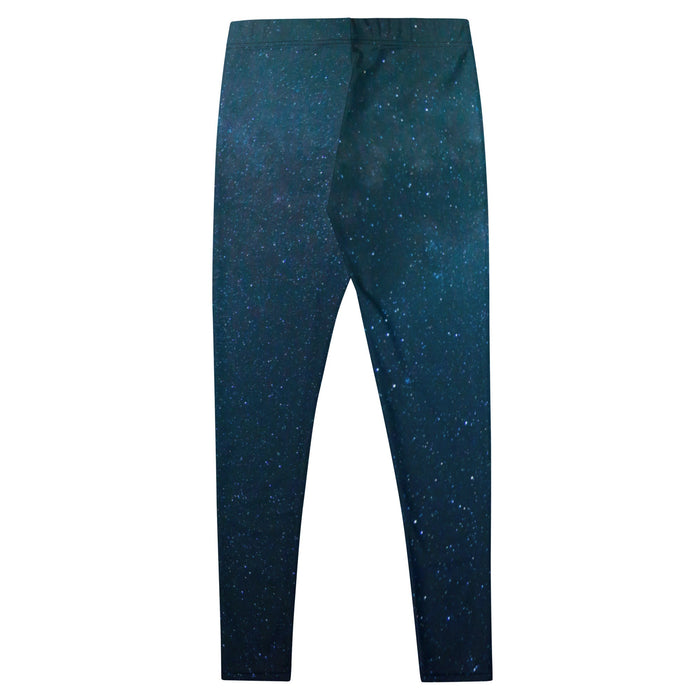 A flat-laid pair of Deep Space leggings displaying a night sky with faint galaxies on a dark blue and black gradient, against a white background.