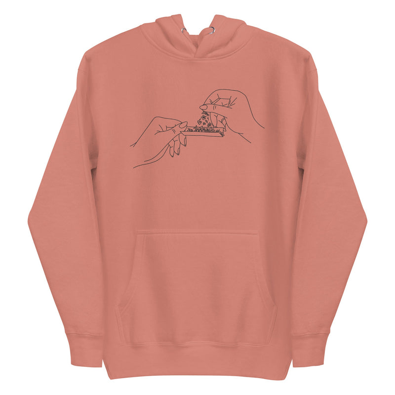 Black and white line art of two hands rolling a joint with flowers, meticulously embroidered on the front chest of a soft, sustainable hoodie.
