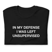 Folded "In my defense, I was left unsupervised" t-shirt available in black, part of the "Funny" collection.
