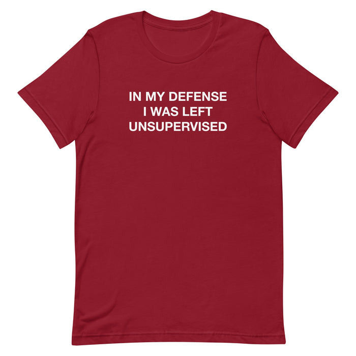 "In my defense, I was left unsupervised" t-shirt available in cardinal red, part of the "Funny" collection.