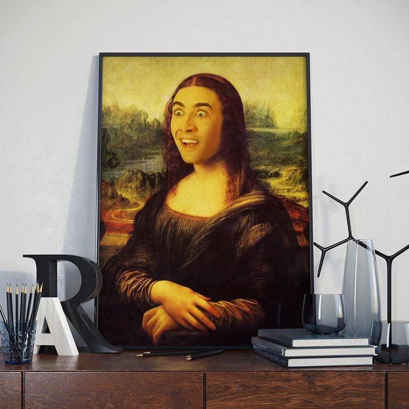 Framed poster of Nicolas Cage’s face edited onto the Mona Lisa painting.