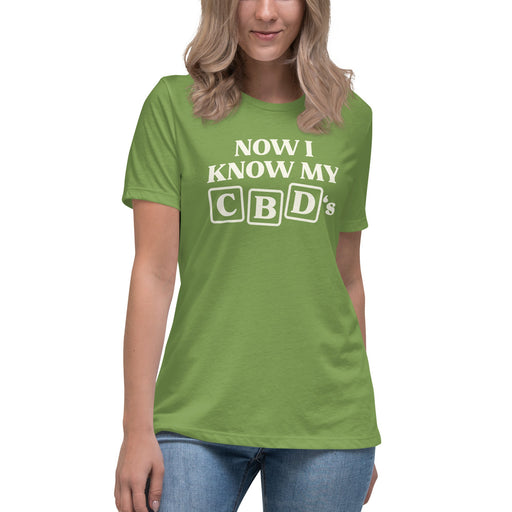 Model wearing the Now I Know My CBDs Women's Relaxed T-Shirt on a white background, featuring a colorful design that puts a CBD-inspired twist on the classic alphabet song.